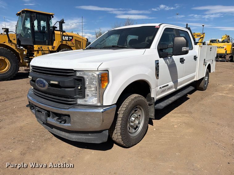 image for item ED0199 2017 Ford F350 Super Duty Crew Cab utility bed pickup truck