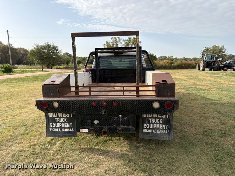 image for item EP7696 2016 Ford F350 Super Duty Crew Cab flatbed pickup truck