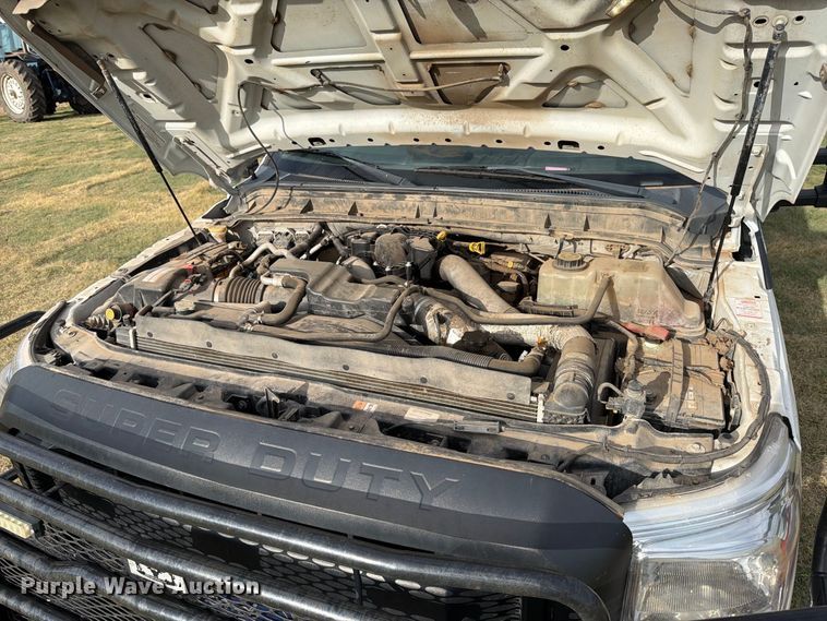 image for item EP7696 2016 Ford F350 Super Duty Crew Cab flatbed pickup truck
