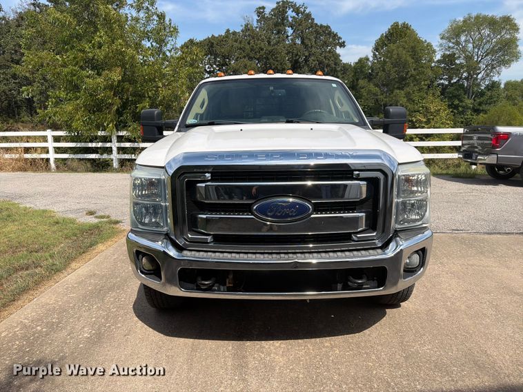 image for item EX0554 2014 Ford F350 Super Duty Crew Cab flatbed pickup truck