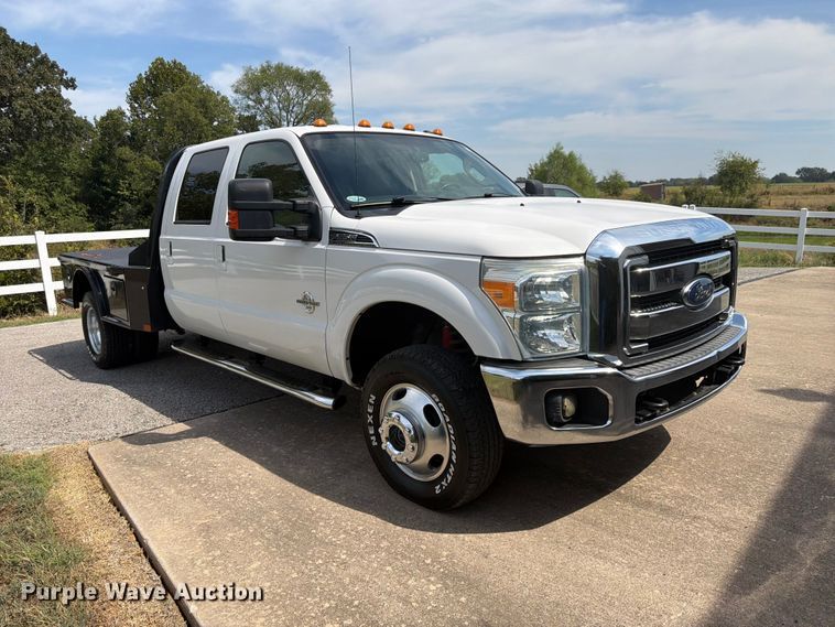 image for item EX0554 2014 Ford F350 Super Duty Crew Cab flatbed pickup truck