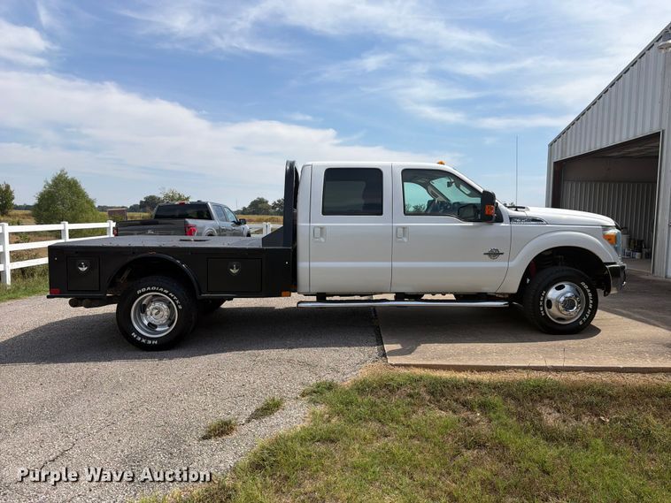 image for item EX0554 2014 Ford F350 Super Duty Crew Cab flatbed pickup truck