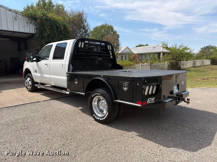 image for item EX0554 2014 Ford F350 Super Duty Crew Cab flatbed pickup truck