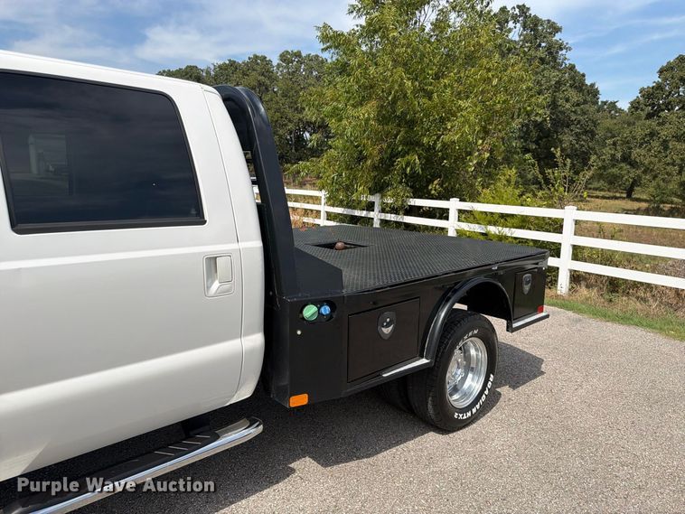 image for item EX0554 2014 Ford F350 Super Duty Crew Cab flatbed pickup truck