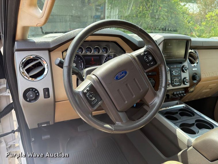 image for item EX0554 2014 Ford F350 Super Duty Crew Cab flatbed pickup truck