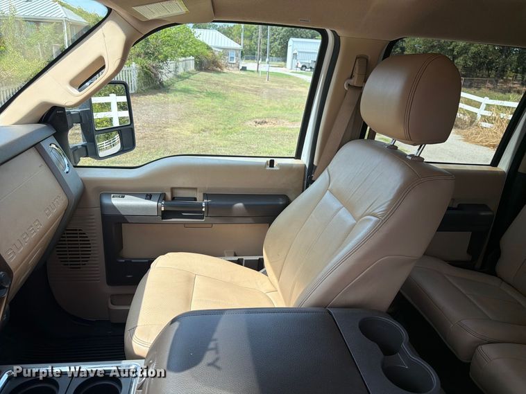 image for item EX0554 2014 Ford F350 Super Duty Crew Cab flatbed pickup truck