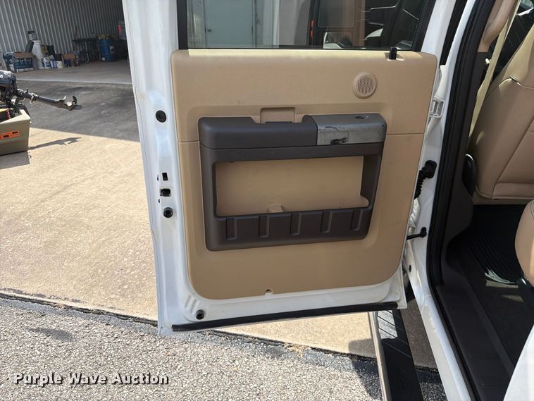 image for item EX0554 2014 Ford F350 Super Duty Crew Cab flatbed pickup truck