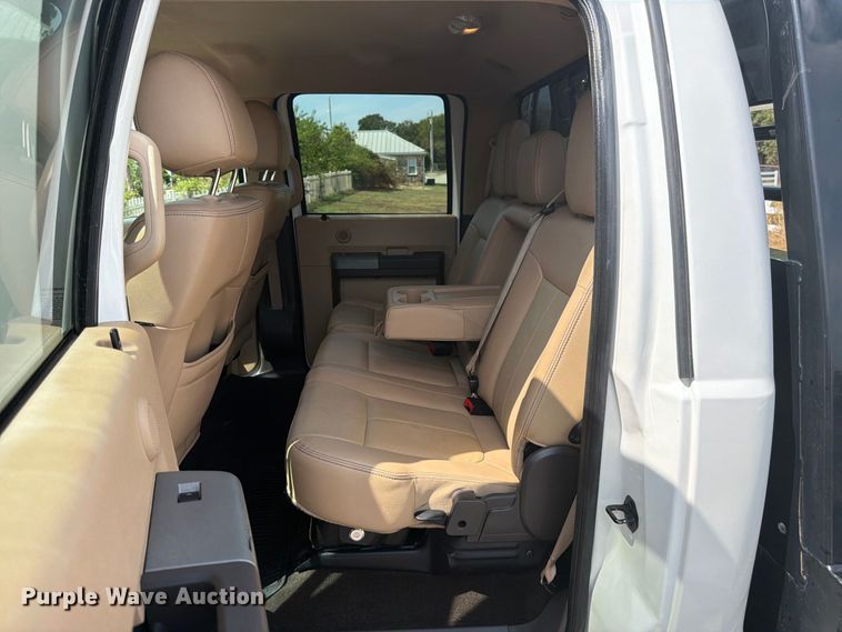 image for item EX0554 2014 Ford F350 Super Duty Crew Cab flatbed pickup truck
