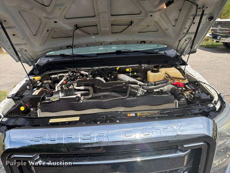 image for item EX0554 2014 Ford F350 Super Duty Crew Cab flatbed pickup truck