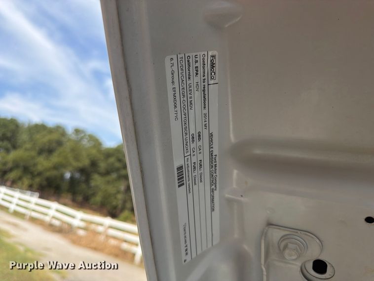 image for item EX0554 2014 Ford F350 Super Duty Crew Cab flatbed pickup truck