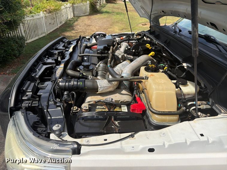 image for item EX0554 2014 Ford F350 Super Duty Crew Cab flatbed pickup truck
