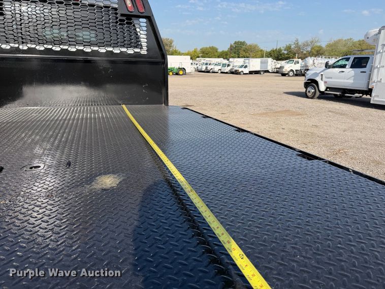 image for item FB5155 2022 Chevrolet Silverado 6500HD Crew Cab flatbed truck