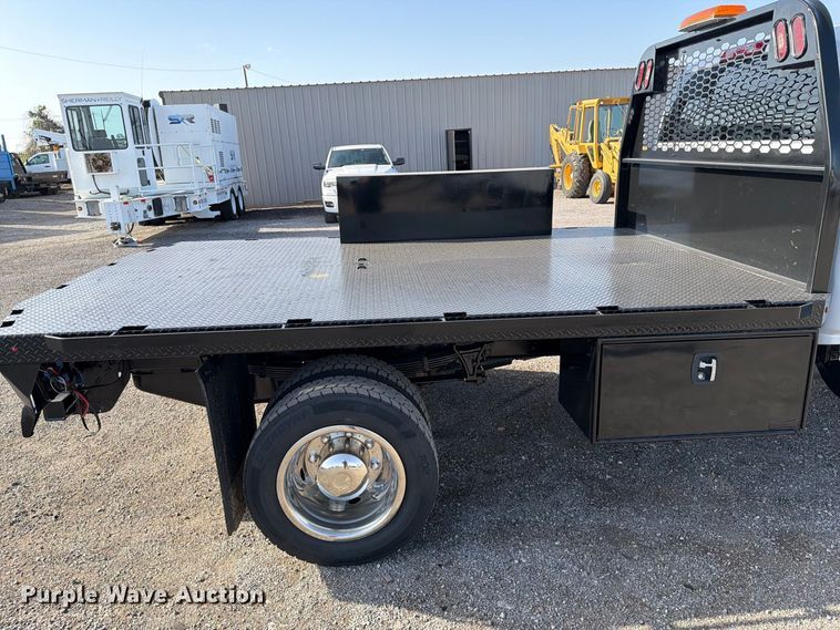 image for item FB5155 2022 Chevrolet Silverado 6500HD Crew Cab flatbed truck