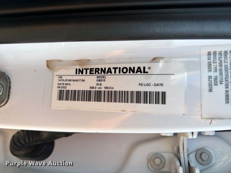 image for item FB5155 2022 Chevrolet Silverado 6500HD Crew Cab flatbed truck