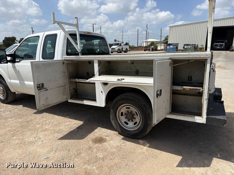 image for item FB8336 2014 Ford F250 Super Duty Ext. Cab utility bed pickup truck