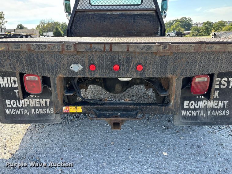 image for item FG0724 2000 International 4700 Lo-Profile flatbed truck