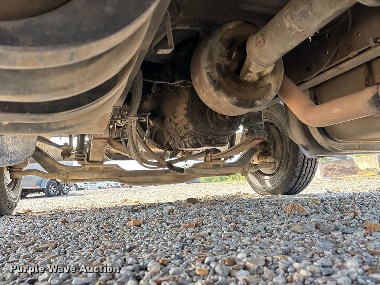 image for item FG0724 2000 International 4700 Lo-Profile flatbed truck
