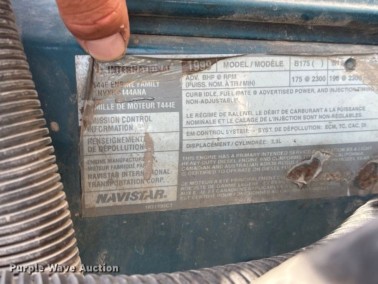 image for item FG0724 2000 International 4700 Lo-Profile flatbed truck
