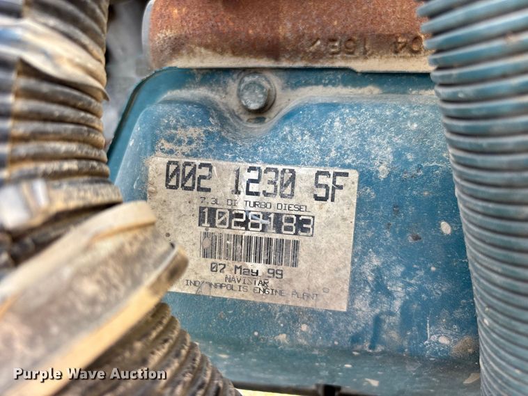 image for item FG0724 2000 International 4700 Lo-Profile flatbed truck
