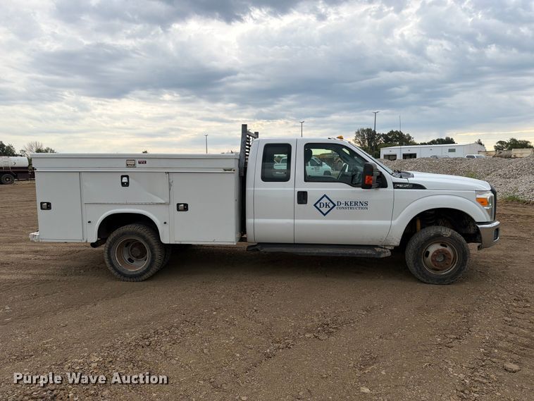 image for item FK5071 2015 Ford F350 Ext. Cab utility bed pickup truck