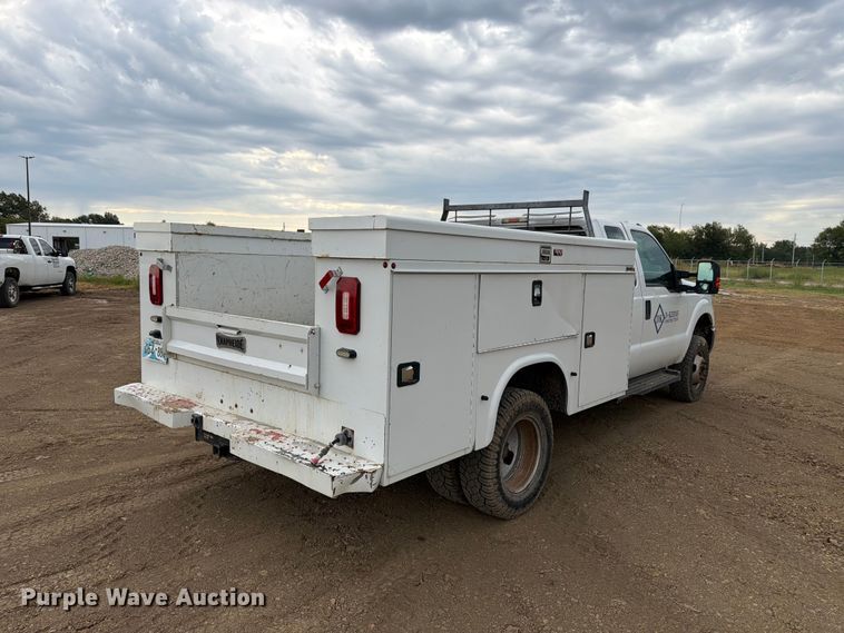 image for item FK5071 2015 Ford F350 Ext. Cab utility bed pickup truck