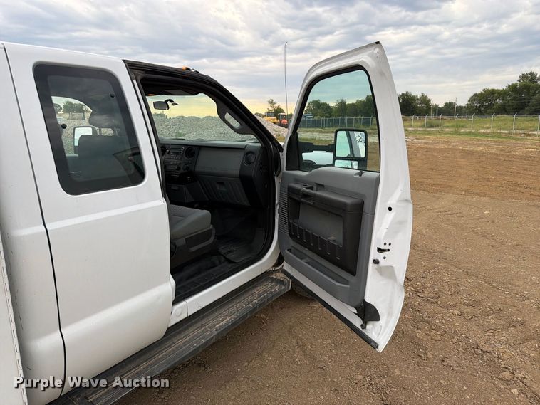 image for item FK5071 2015 Ford F350 Ext. Cab utility bed pickup truck