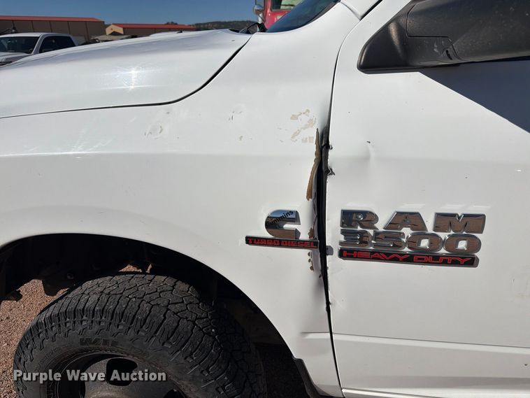 image for item FM7667 2018 RAM 3500 Crew Cab flatbed pickup truck