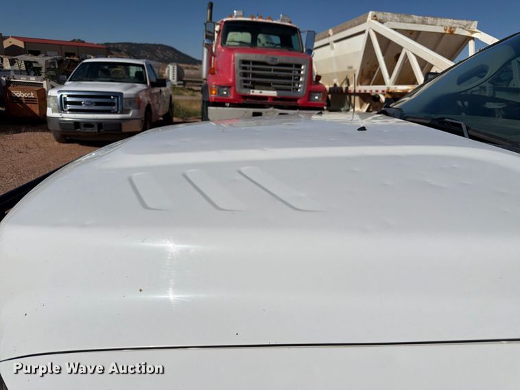 image for item FM7667 2018 RAM 3500 Crew Cab flatbed pickup truck