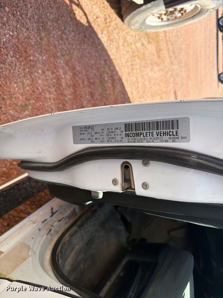 image for item FM7667 2018 RAM 3500 Crew Cab flatbed pickup truck