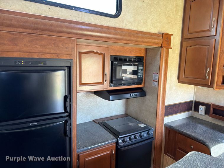 image for item FN5860 2010 Keystone RP3912LEV10 toy hauler camper