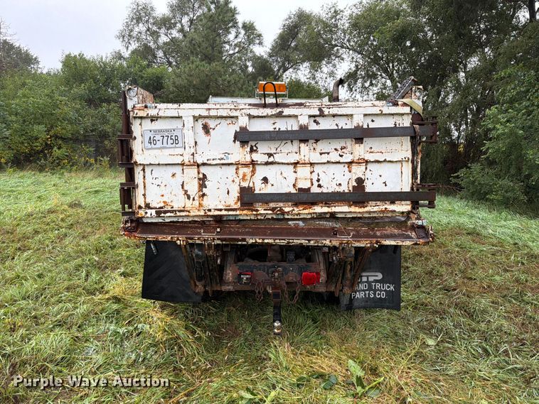 image for item FP3099 1985 International 1954 Crew Cab dump truck
