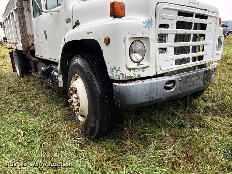 image for item FP3099 1985 International 1954 Crew Cab dump truck