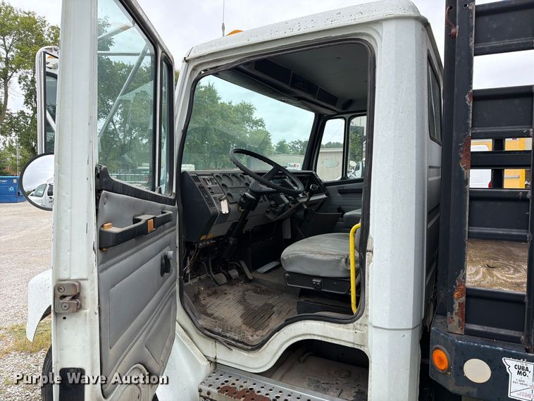 image for item FT6304 2000 Freightliner FL70 flatbed truck