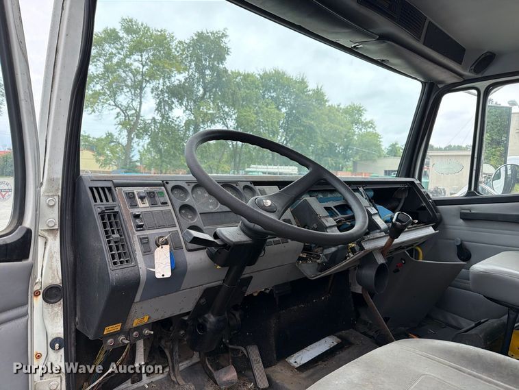 image for item FT6304 2000 Freightliner FL70 flatbed truck
