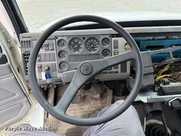 image for item FT6304 2000 Freightliner FL70 flatbed truck