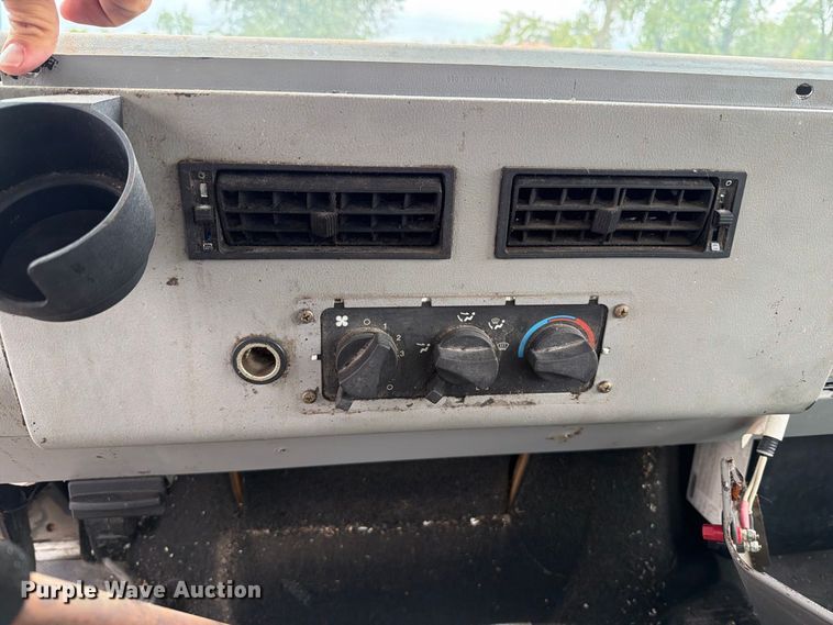 image for item FT6304 2000 Freightliner FL70 flatbed truck