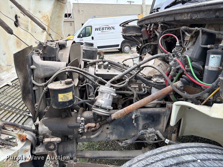 image for item FT6304 2000 Freightliner FL70 flatbed truck