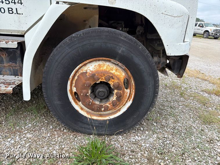 image for item FT6304 2000 Freightliner FL70 flatbed truck