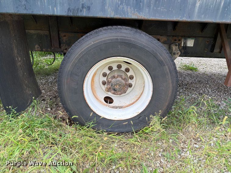 image for item FT6304 2000 Freightliner FL70 flatbed truck
