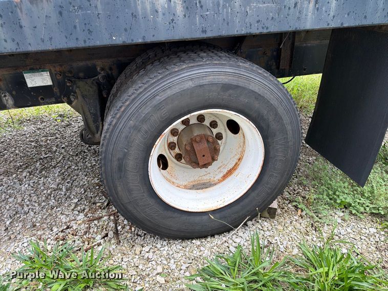 image for item FT6304 2000 Freightliner FL70 flatbed truck