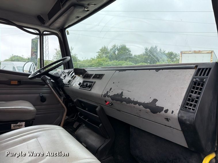 image for item FT6305 2000 Freightliner FL70 flatbed truck