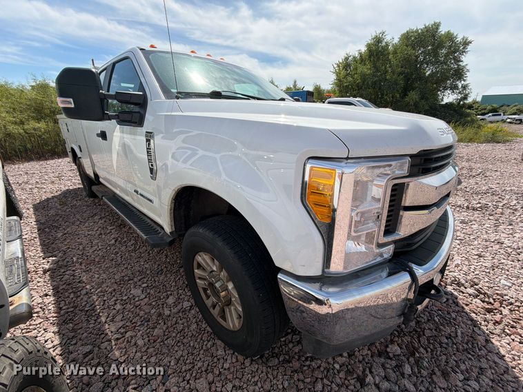 image for item YA4472 2017 Ford F350 Super Duty Ext. Cab utility bed pickup truck