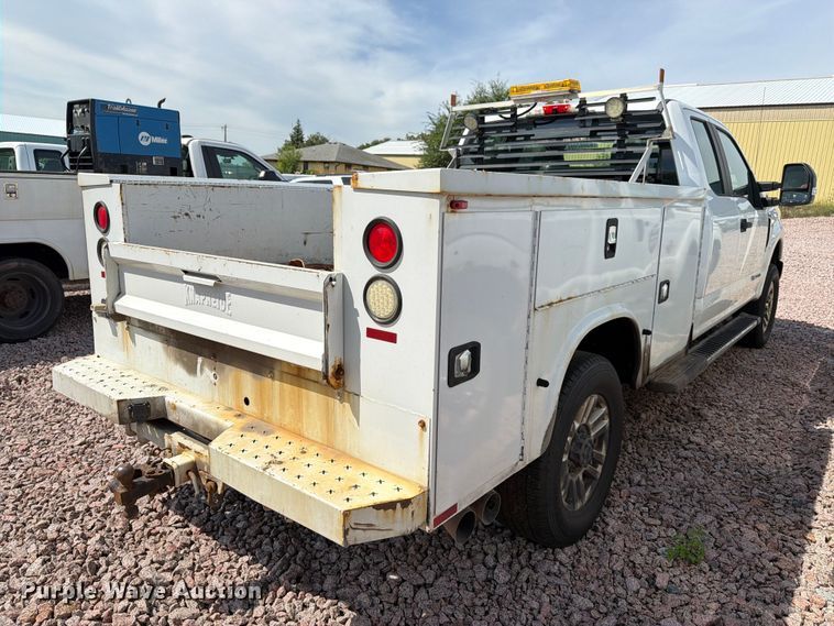 image for item YA4472 2017 Ford F350 Super Duty Ext. Cab utility bed pickup truck