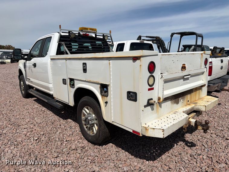 image for item YA4472 2017 Ford F350 Super Duty Ext. Cab utility bed pickup truck