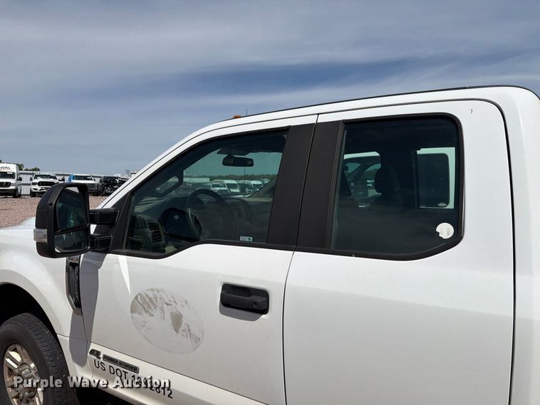 image for item YA4472 2017 Ford F350 Super Duty Ext. Cab utility bed pickup truck