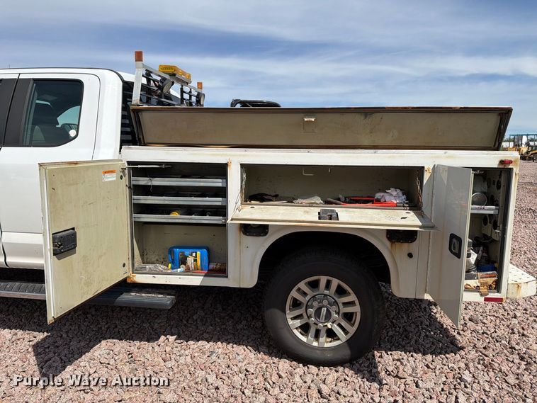image for item YA4472 2017 Ford F350 Super Duty Ext. Cab utility bed pickup truck