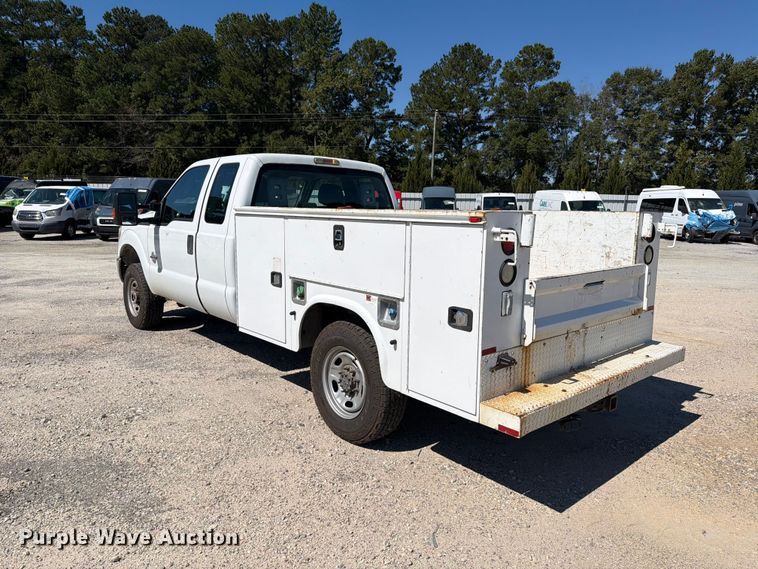 image for item YA5214 2016 Ford F250 Super Duty Ext. Cab utility bed pickup truck