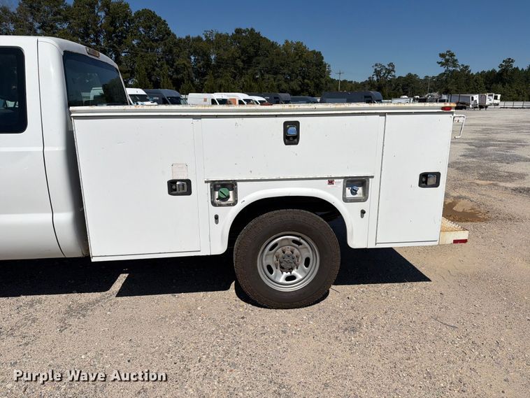 image for item YA5214 2016 Ford F250 Super Duty Ext. Cab utility bed pickup truck