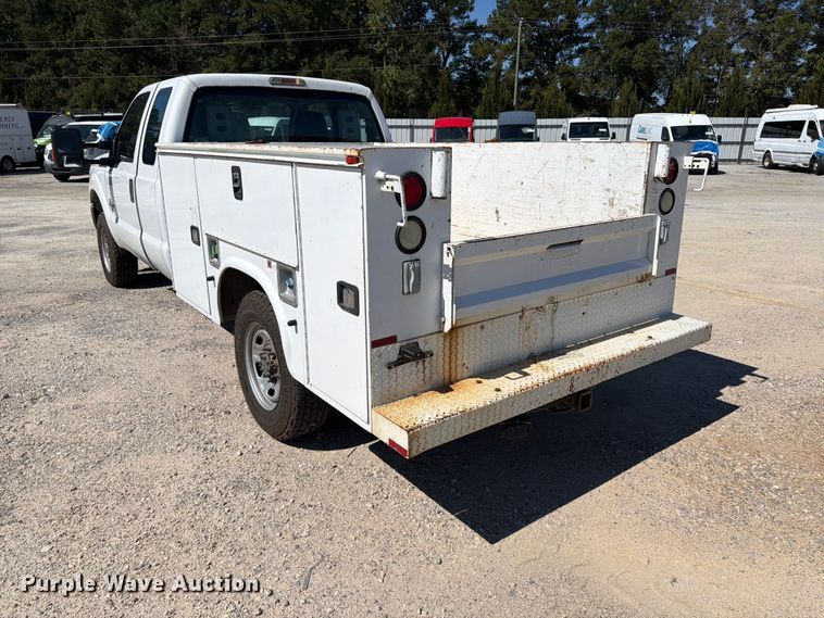 image for item YA5214 2016 Ford F250 Super Duty Ext. Cab utility bed pickup truck