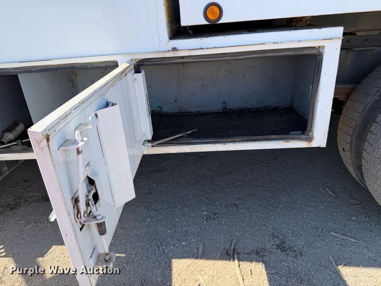 image for item EA0044 2005 GMC C6 chipper truck